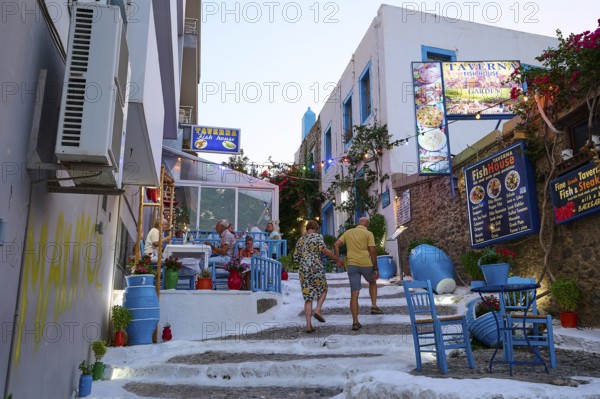 Riga Fereou, Steps of Kos, famous alley, picturesque alleyway with tavernas, colourful chairs and