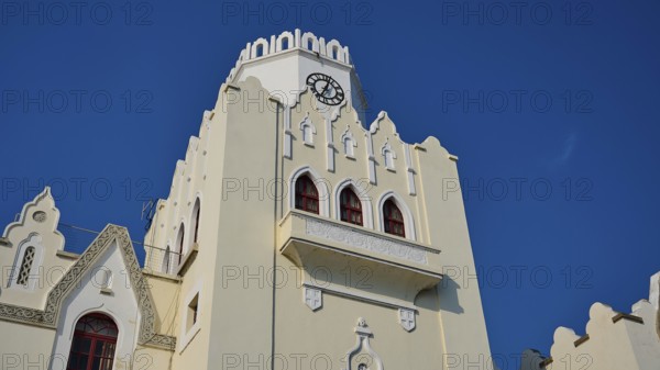 Palace of Justice, colonial building, Gothic-style bell tower with clock and battlements under a