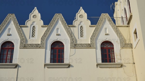 Palace of Justice, colonial building, close-up of a Gothic façade with windows and ornamental