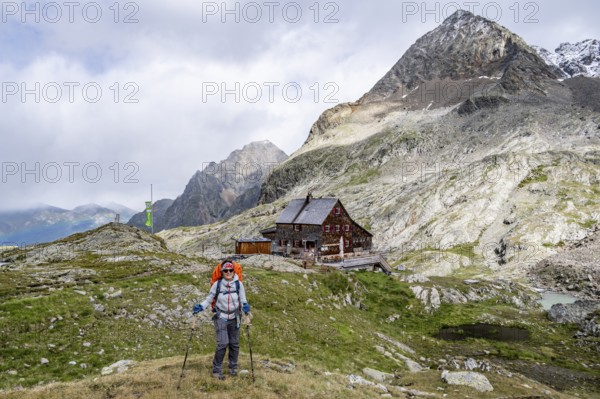 Hiker on the way to the Adolf Nossberger Hut, Schober Group, Hohe Tauern National Park, Carinthia,
