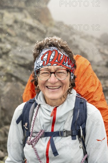 Laughing woman, portrait, mountaineer with snow in her hair, Hornscharte, Wiener Höhenweg, Schober