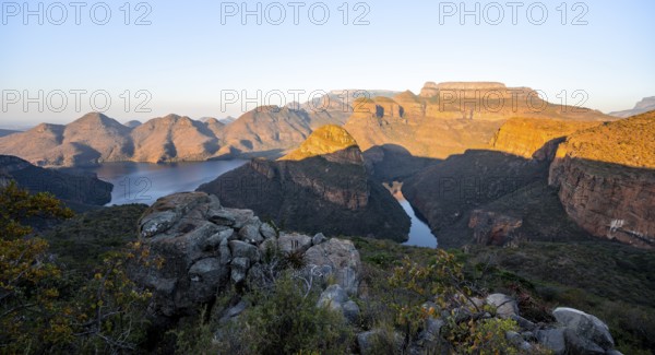 Sunset at Blyde River Canyon with Three Rondawels peak, view of canyon with Blyde River and table