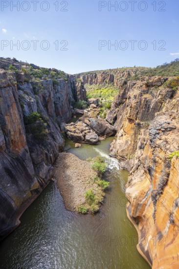 Canyon with steep orange-coloured cliffs with the Blyde River, Bourke's Luck Potholes, Panorama