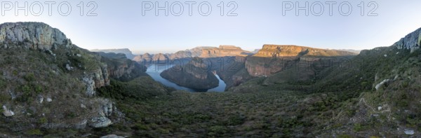 Sunset at Blyde River Canyon with Three Rondawels peak, view of canyon with Blyde River and table
