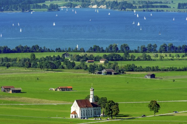 View from Neuschwanstein Castle to the pilgrimage church of St Coloman, Forggensee, Schwangau,
