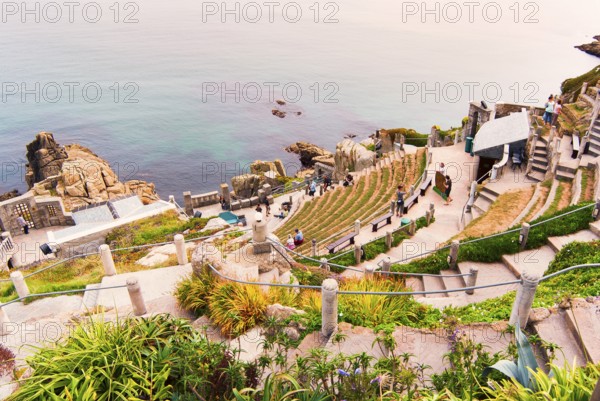 Minack Theatre, spectacular open-air theatre, circular path with lush planting, South England