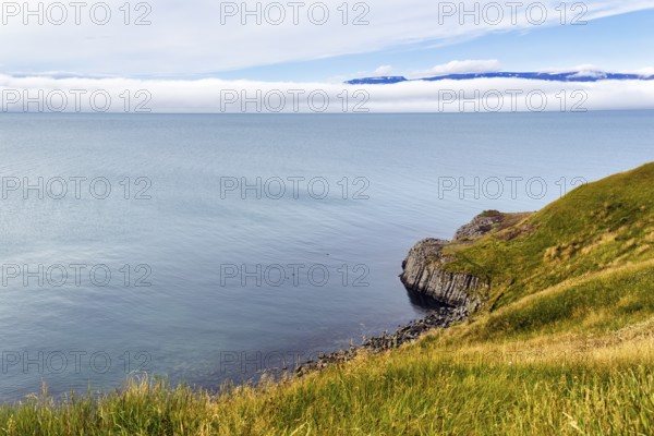 Coastline with basalt columns near Hofsos, Skagafjördur fjord, Tröllaskagi peninsula, North