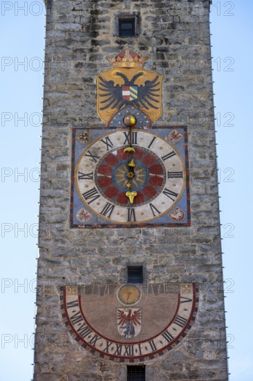 Colourful tower clock with coat of arms and sundial, Zwölferturm, historic old town, Sterzing,