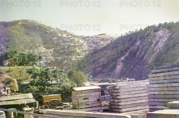 Squatter settlement huts on hillside, Pak Uk Tsai Road, New Territories, Kong Hong, Asia 1965
