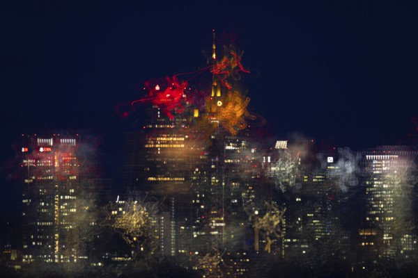The lights of Frankfurt's banking skyline glow in the night. (long exposure), Frankfurt, Hesse,