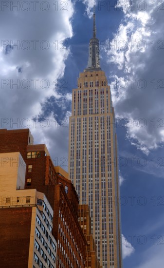 Empire State Building, built 1930-1931, 102 storeys, cloudy sky, New York City, USA