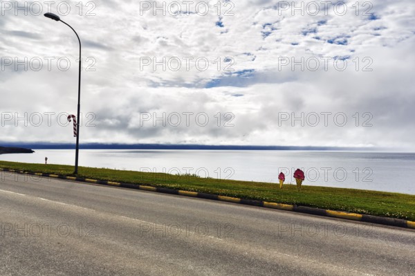 Ice cream cones and candy cane, coastal road, decoration on Candy Day, Candy Days, town festival in