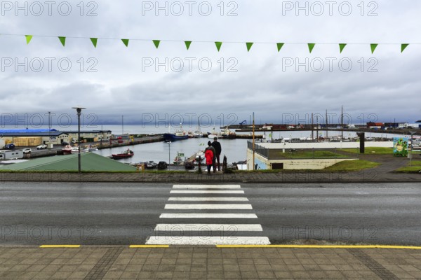 View of the harbour, fishing village at Skjalfandi Bay, rain clouds, Husavik, Húsavík, North