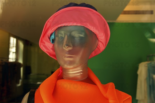 Female mannequin made of transparent plastic with floppy hat, New York City, USA