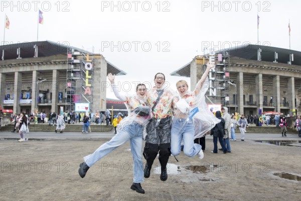 Festival visitors in front of the Olympic Stadium at the Lollapalooza Festival in the Olympic