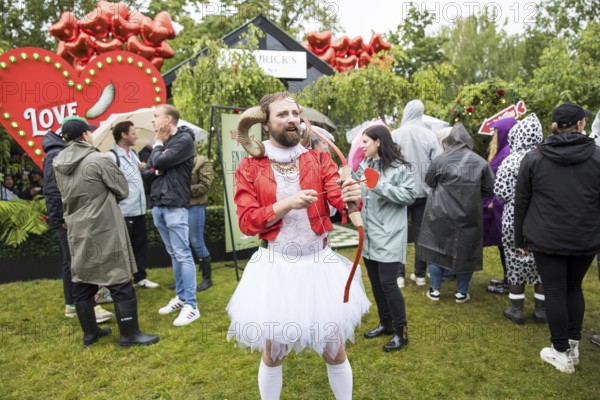 Cupid with bow and arrow at the Lollapalooza Festival in the Olympiastadion and on the Maifeld,