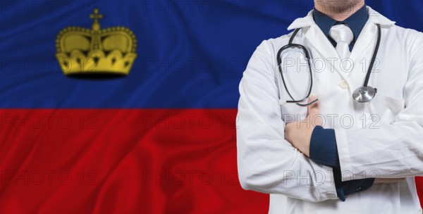 Male doctor with stethoscope on Liechtenstein flag. Doctor holding stethoscope on Liechtenstein