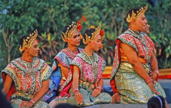 Young actors watch a Thai drama performance in Bangkok, Thailand, December 2002, vintage, retro,