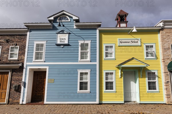 Replica, historic town hall, historic elementary school, colorful facades, signs with inscription,