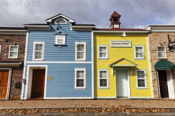 Replica, historic town hall, historic elementary school, colorful facades, signs with inscription,