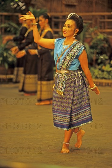 Performance of traditional dances in the Rose Garden near Bangkok, Thailand, December 2002,