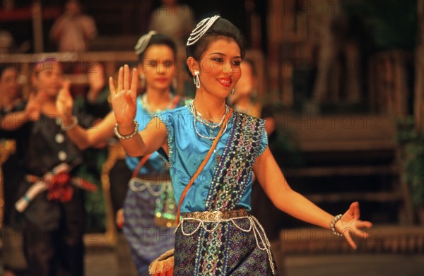 Performance of traditional dances in the Rose Garden near Bangkok, Thailand, December 2002,