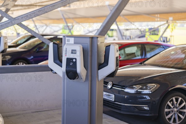 Electric cars at a charging station in a modern parking garage, e-charging park, Merklingen,
