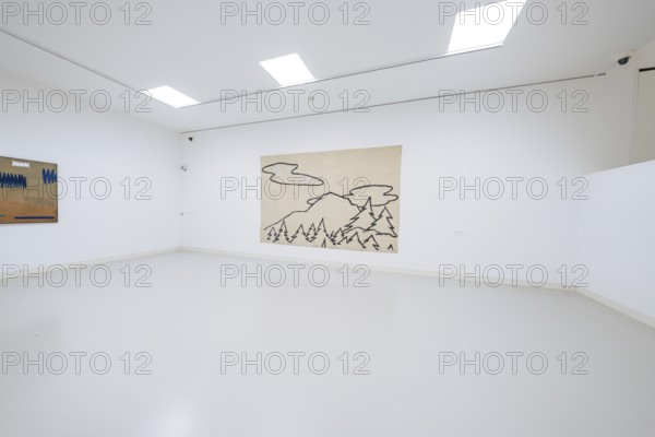 A minimalistic gallery space with a mountain work of art on the wall, Schauwerk, Sindelfingen,