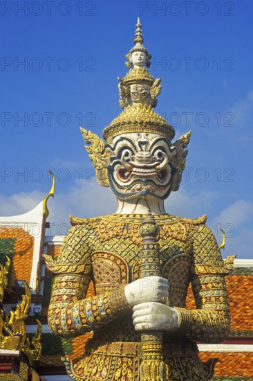 Temple guard, Yaksa Tavarnbal, at one of the entrances to Wat Phra Kaeo, Bangkok, Thailand,