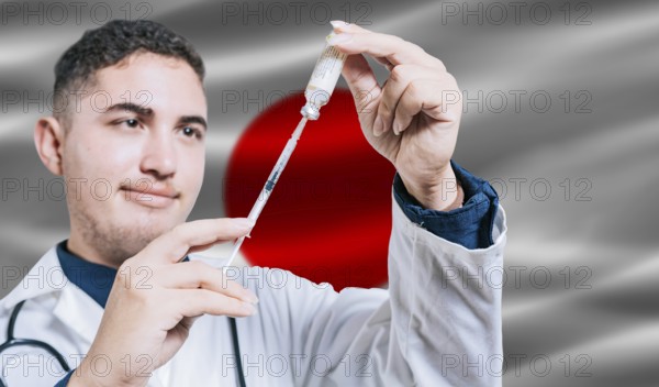 Doctor holding syringe on Japan flag background. Medical professional holding syringe with Japanese
