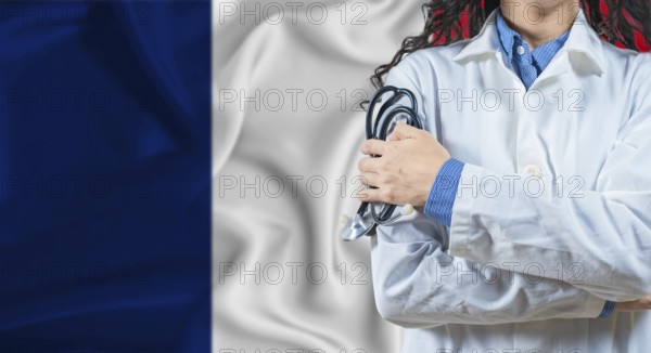 Healthcare professional with France flag background. Professional doctor holding stethoscope on