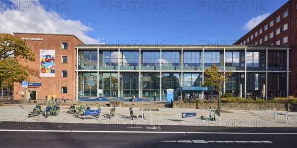 New town hall, tourist information, welcome center, brick building, modern building, glass façade,