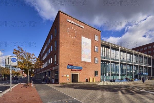 New town hall, brick building, brick architecture, modern architecture, façade with windows, trees,