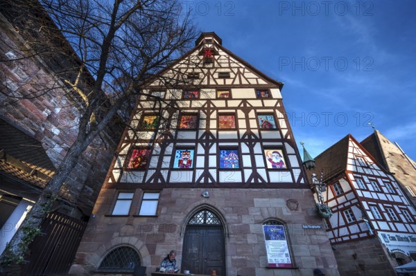 Historic Pilate House with the annual advent calendar in the evening sun, Tiergärtnertor,