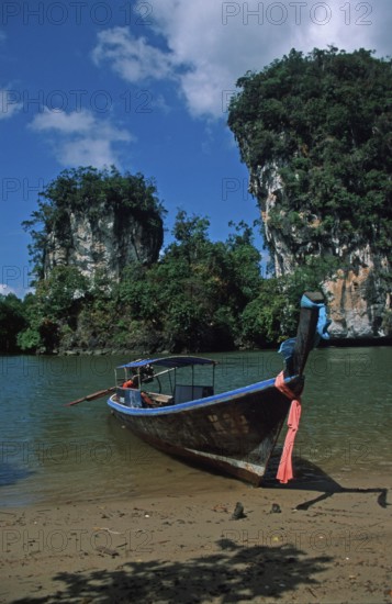 Longtail boat on the banks of the tidal river near Krabbi, two years in front of the tsunami,