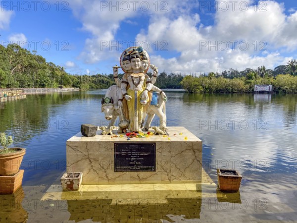 Three-headed sculpture Statue of Dattatreya embodiment of triform Trimurti combines characteristics