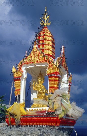 Shrine in Wat Tam Sua monastery, which is partly on the top of a mountain, Krabi, Thailand,