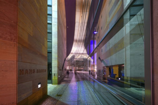 Evening reflection in the glass façade of the Neues Museum, State Museum of Art and Design,
