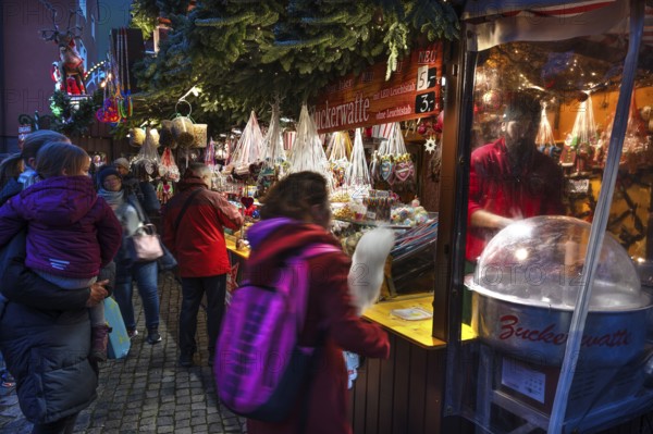 Cotton candy at a candy stand at the Christmas market for children in Nuremberg, Middle Franconia,