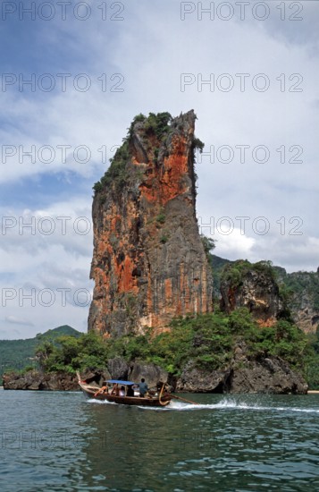 Rocks in the sea, longtail boat, two years in front of the tsunami, Railay, Krabi, Thailand,