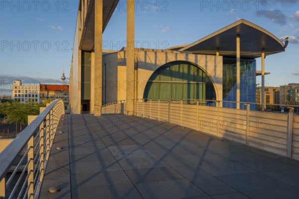 Footbridge with Marie-Elisabeth Lüders House in the evening light on the Spree in the government