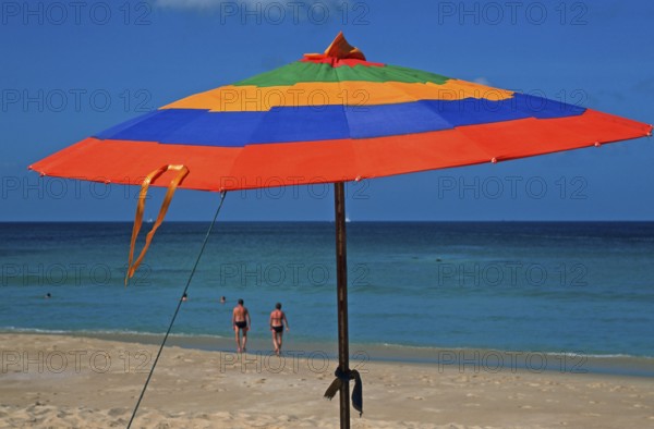 People, parasol on Karon Beach, two years in front of the tsunami, Ko Phuket, Thailand, December
