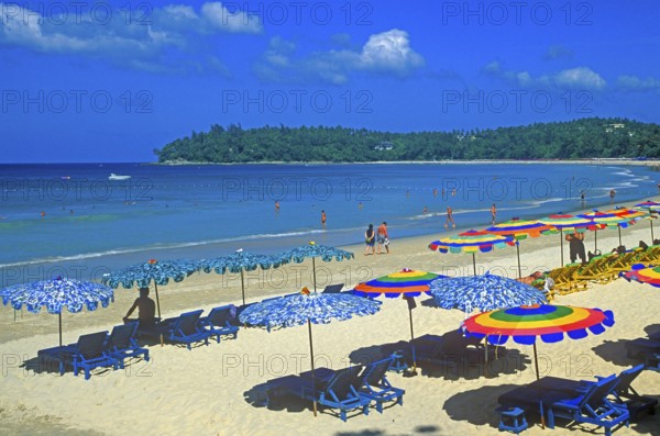 People, umbrellas, Kata Beach, two years in front of the tsunami, Ko Phuket, Thailand, December