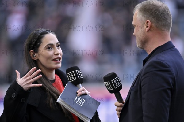 DAZN presenter reporter Ann-Sophie Kimmel interviewed Mikrophon Mikro Logo with Sports Board Fabian
