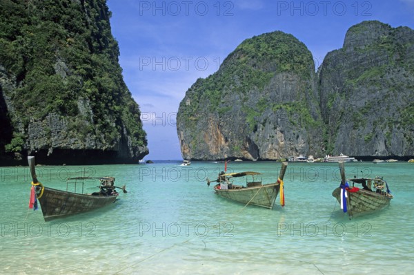 Longtail boats on Maya Bay beach, known from the movie The Beach, one year in front of the tsunami,
