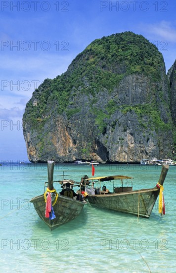 Longtail boats on Maya Bay beach, known from the movie The Beach, one year in front of the tsunami,