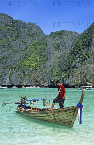 Boatmaster, longtail boat on Maya Bay beach, known for the movie The Beach, one year in front of