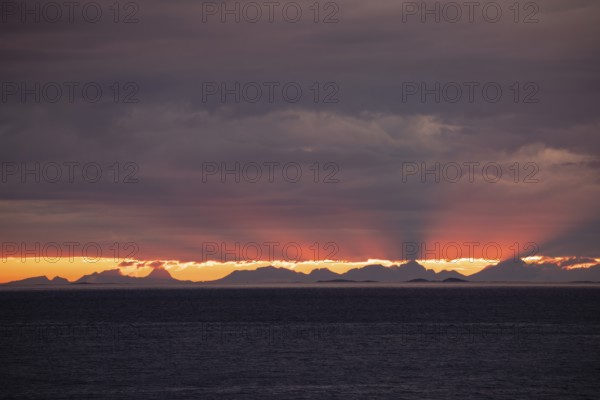 The Vestfjord in Nordland, Norway, offers a dramatic atmosphere near Bodø. Dark clouds are
