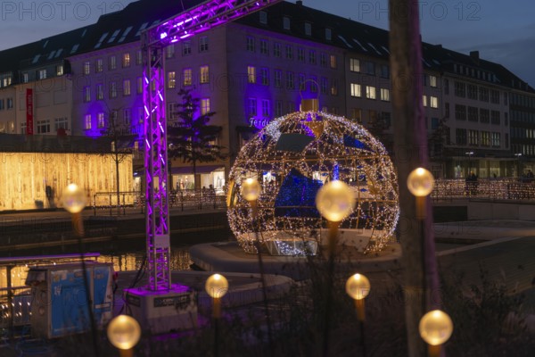 Christmas decoration in Kiel at the boat harbor, festive lighting, lights, Christmas ball, shops,