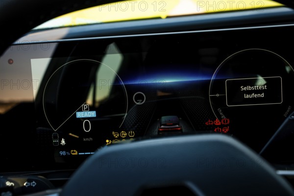 Modern digital car dashboard with various displays in a nocturnal atmosphere, Deer e-Carsharing,